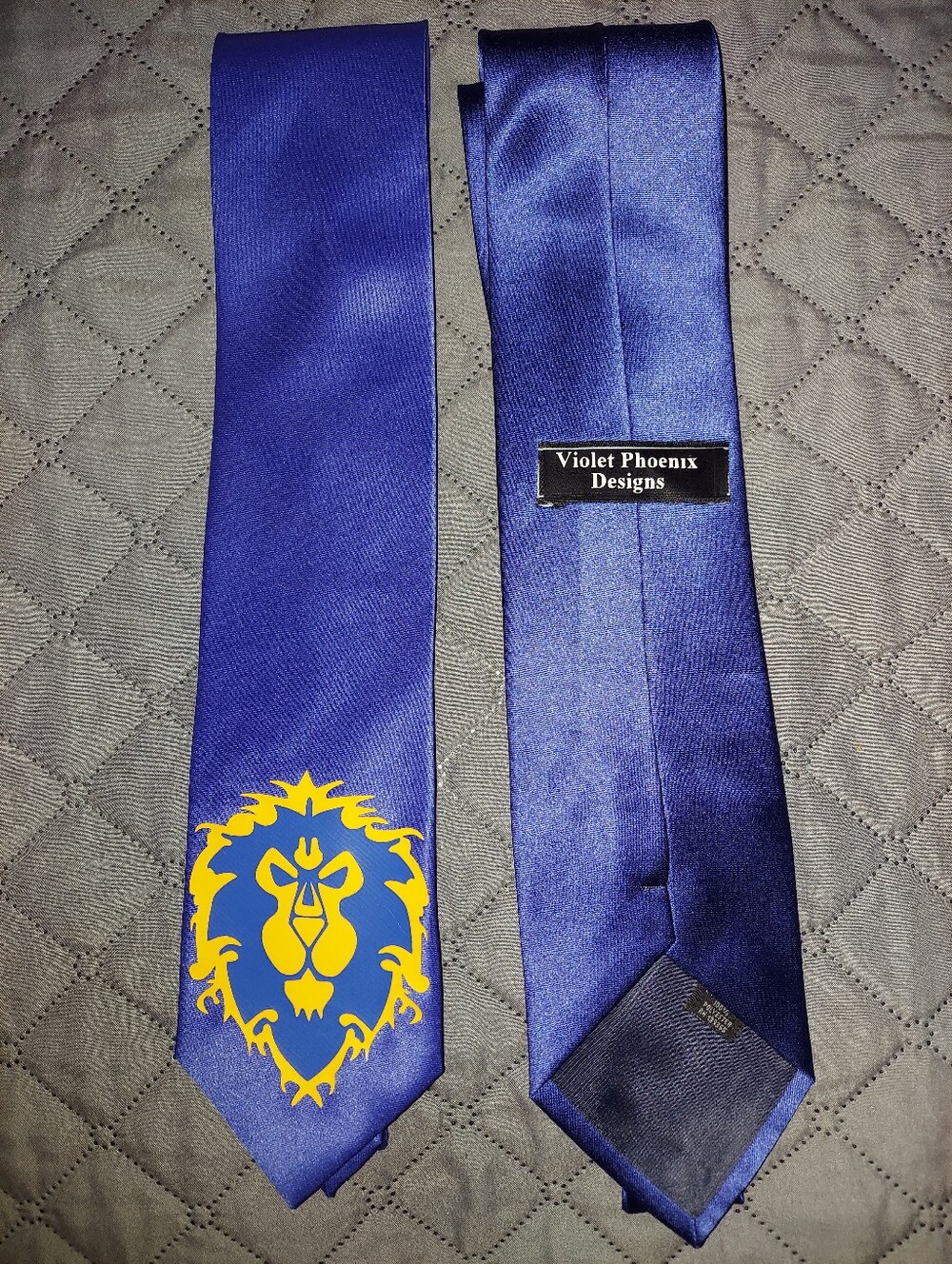 Men's Blue Satin Tie with gold Alliance lion crest emblem from World of Warcraft